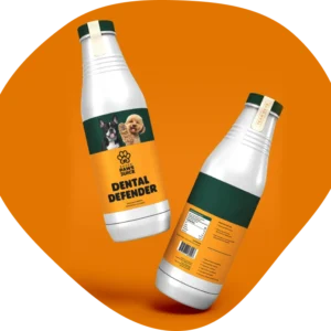 Two bottles of dental milk on a orange background